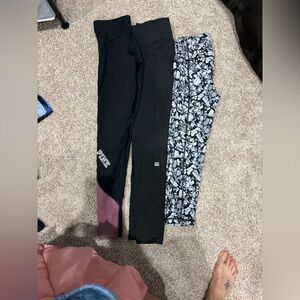 3 pair of VS/PINK workout leggings. 2 7/8 and 1 capri all Small